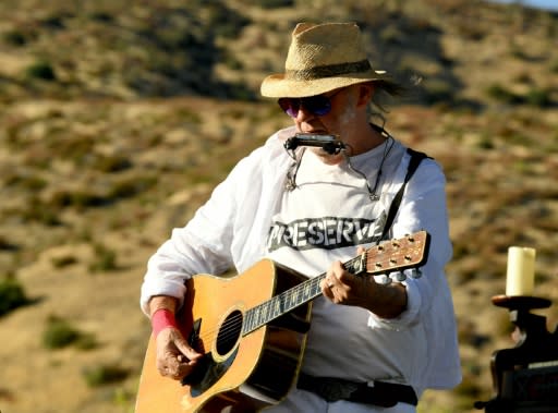 Neil Young, shown here performing at Harvest Moon: A Gathering to benefit The Painted Turtle and The Bridge School in California, is set to release a new album