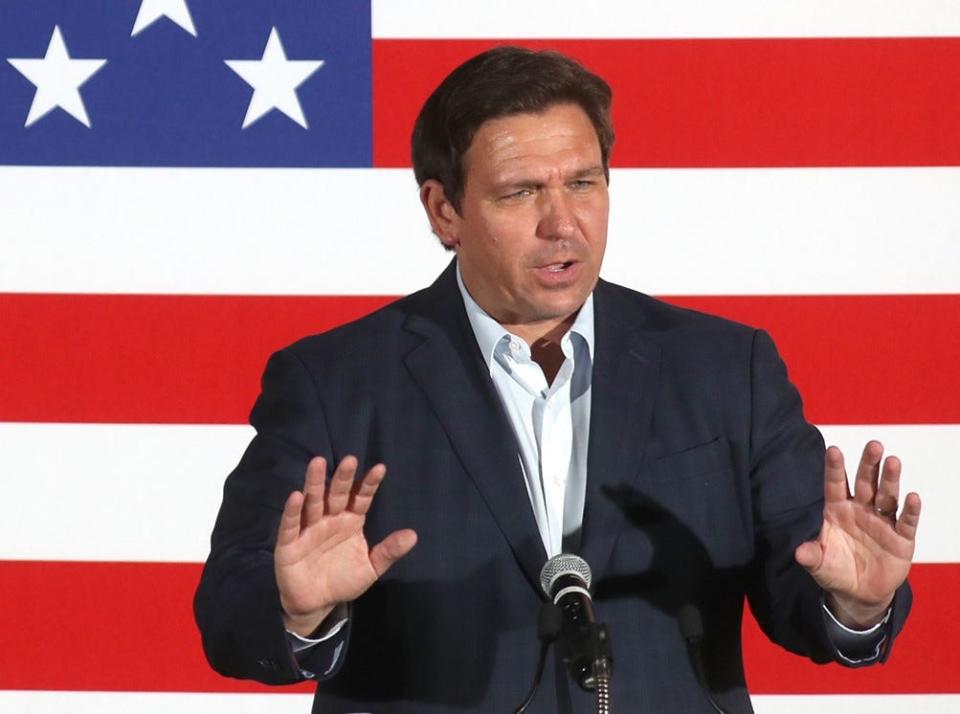 Florida Governor Ron DeSantis speaks to a crowd of 500 to 1,000 supporters at the Sahib Shriner Event Center recently. DeSantis announced Friday that he is removing four Broward County School Board members from office. MATT HOUSTON/HERALD-TRIBUNE