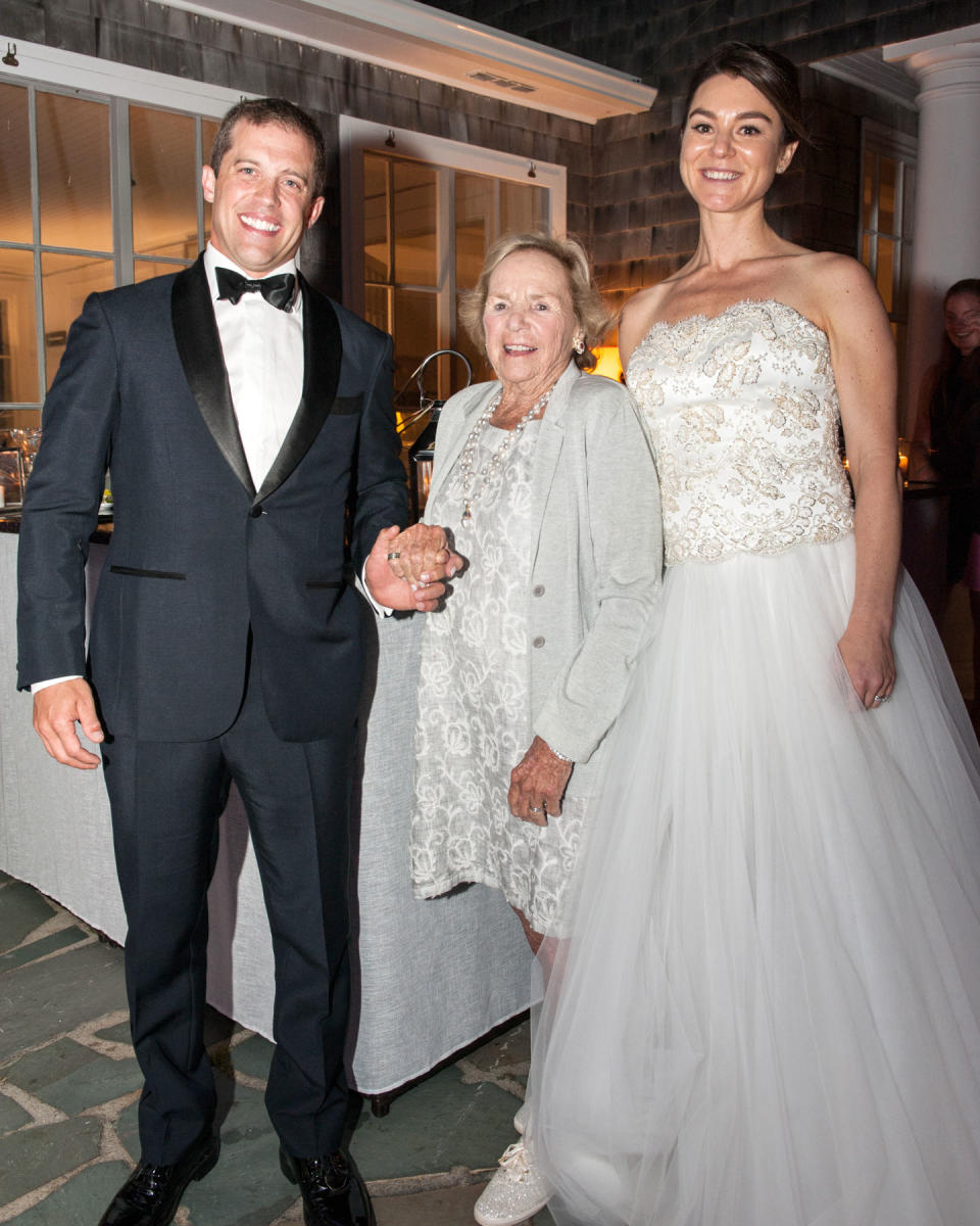 <p>The groom, Ethel Kennedy and the bride</p>