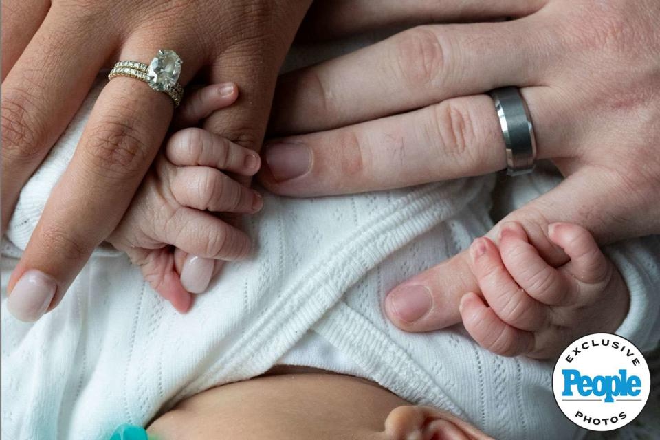 <p>Sam Lewis</p> Bliss Poureetezadi-Goytowski and Zack Goytowski and daughter Galileo.