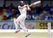 India's Rohit Sharma plays a shot during the fourth day of their third and final test cricket match against Sri Lanka in Colombo August 31, 2015. REUTERS/Dinuka Liyanawatte