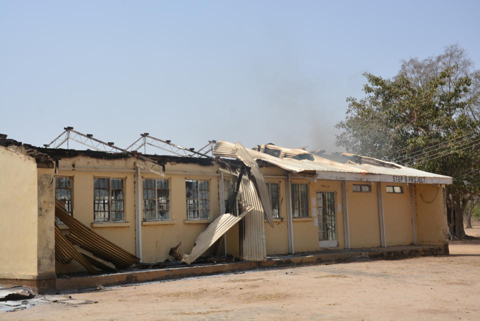 This Tuesday, Feb. 25, 2014, photo, shows the remains of the burned out Federal Government College in Buni Yadi, Nigeria. Islamic militants killed dozens of students in a pre-dawn attack Tuesday on the northeast Nigerian school, survivors said, setting ablaze a locked dormitory and shooting and slitting the throats of those who escaped through windows. Some were burned alive. (AP Photo)