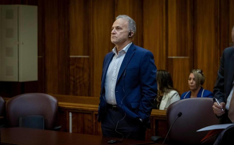 Miguel Marin stands alone in the courtroom Thursday as the guilty verdict is read in Judge Miguel de la O’s courtroom. Manuel Marin was accused in a murder-for-hire plot that killed Camilo Salazar, whose body was found partially burned on a dirt road in the Florida Everglades in 2011.