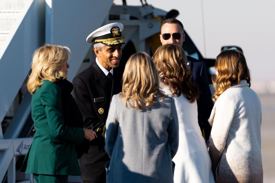 First lady Jill Biden, left, and U.S. Surgeon General Dr. Vivek H. Murthy, center, make introductions upon their arrival at Signature Aviation SLC in Salt Lake City on Tuesday, Jan. 16, 2024. | Megan Nielsen, Deseret News