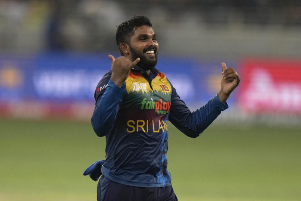 Sri Lanka's Wanindu Hasaranga de Silva celebrates the dismissal of Pakistan's Mohammad Rizwan during the T20 cricket Asia Cup final match between Pakistan and Sri Lanka, in Dubai, United Arab Emirates, Sunday, Sept. 11, 2022. (AP Photo/Anjum Naveed)