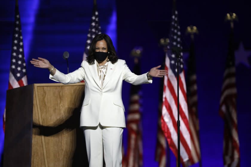 Wilmington, Delaware-Nov. 7, 2020- Vice-President-elect Kamal Harris wave to the crowd at the Chase Center in Wilmington, Delaware, on Nov. 7, 2020. (Carolyn Cole / Los Angeles Times)