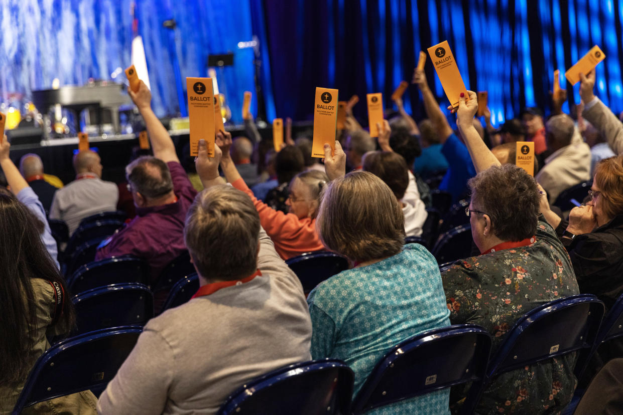 Delegates at the annual meeting of the Southern Baptist Convention vote to condemn in vitro fertilization, June 11, 2024. (Maddie McGarvey/The New York Times)