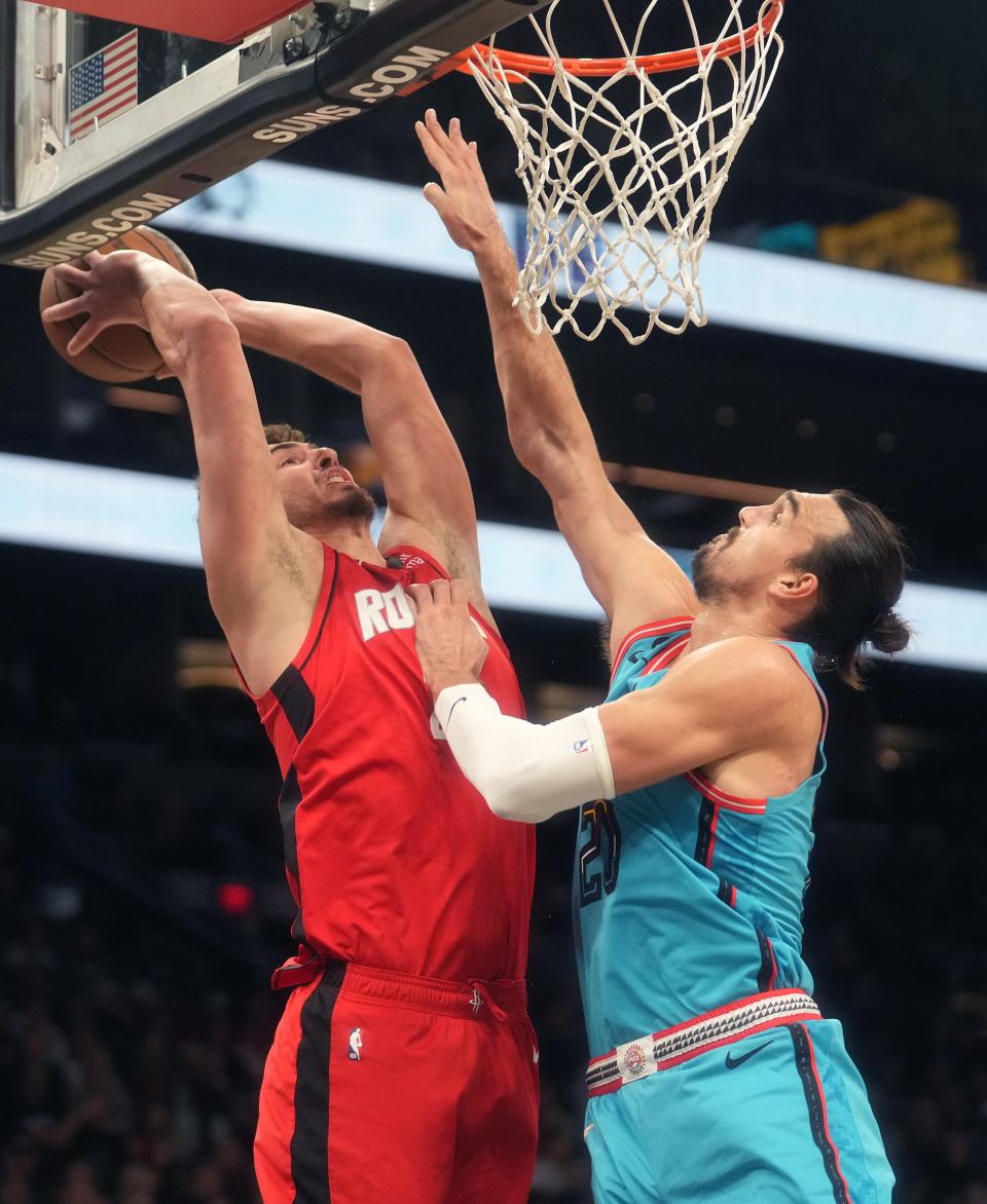 Dec 2, 2022; Phoenix, AZ, USA; Phoenix Suns forward Dario Saric (20) defends a shot shot by Houston Rockets center Alperen Sengun (28) at Footprint Center. Mandatory Credit: Joe Rondone-Arizona Republic