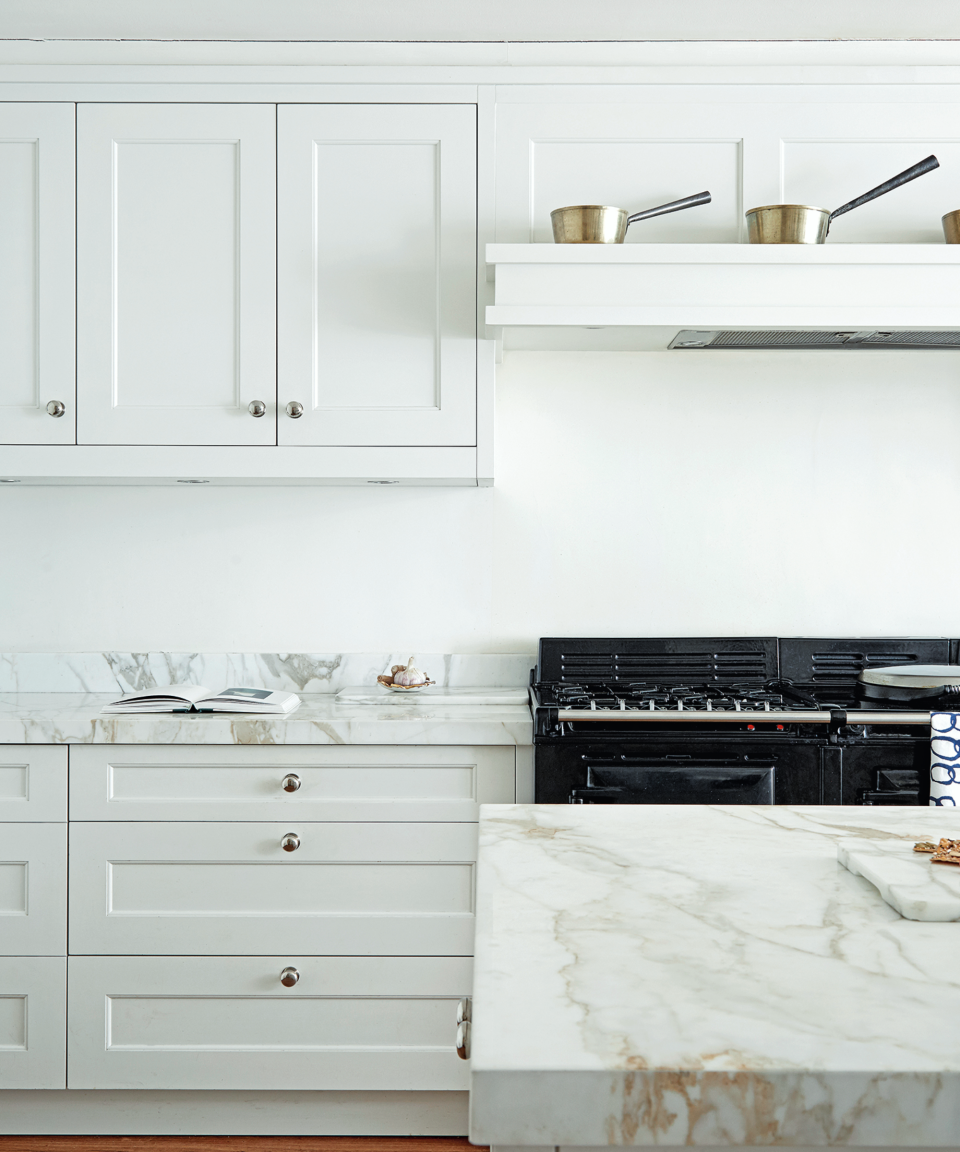 <p> A white kitchen color scheme with marble countertops and a black oven. </p> <p> Natasha, from Lick, says: &apos;Classic for a reason, white paint is known for its light-reflecting properties, making your walls &quot;recede&quot; and opening up small spaces.&#xA0; </p> <p> &apos;Our top picks include the creamy White 03 - a soft white with yellow undertones that can open up your kitchen while keeping those warm, cozy vibes. If you want the ultimate in light reflection, White 01 is a brilliant white but with gray undertones that can boost the energy levels of any small kitchen ideas.&#xA0; </p> <p> &apos;White creates a feeling of calmness. When used in a kitchen, it can make the space feel clean, sophisticated, and elegant.&apos; There&apos;s so much scope when it comes to white kitchen ideas, with endless options to choose from. </p>