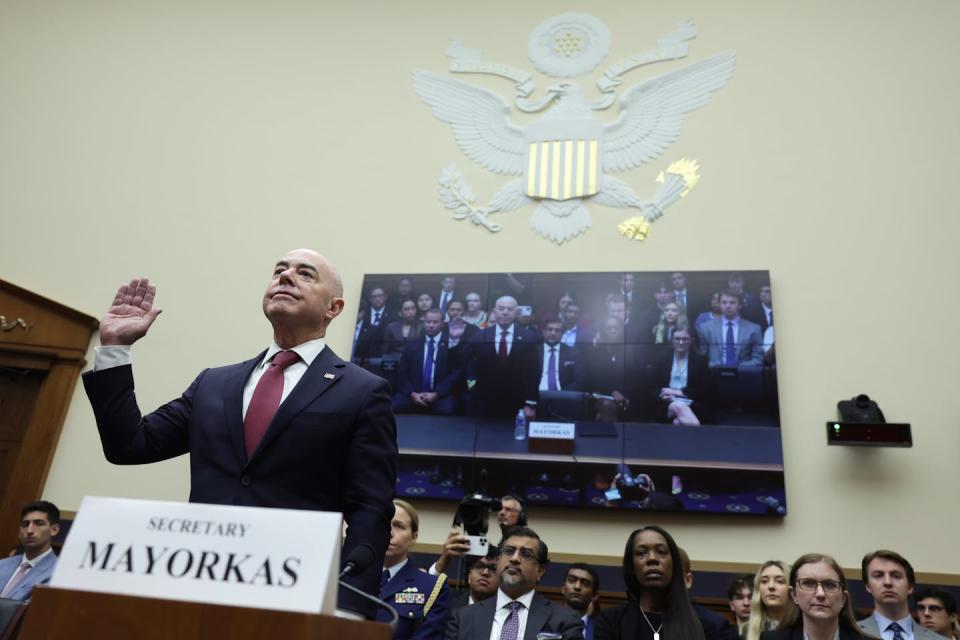 U.S. Secretary of Homeland Security Alejandro Mayorkas is sworn in during a hearing on July 26, 2023, before the House Committee on the Judiciary concerning oversight of Mayorkas’ agency. <a href="https://www.gettyimages.com/detail/news-photo/secretary-of-homeland-security-alejandro-mayorkas-is-sworn-news-photo/1572057397?adppopup=true" rel="nofollow noopener" target="_blank" data-ylk="slk:Alex Wong/Getty Images;elm:context_link;itc:0;sec:content-canvas" class="link ">Alex Wong/Getty Images</a>