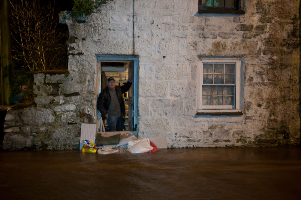 The centre of Newlyn, Cornwall is deep in flood water after heavy rain in the area (SWNS)