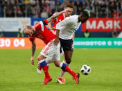Soccer Football - International Friendly - Russia vs France - Saint-Petersburg Stadium, Saint Petersburg, Russia - March 27, 2018 France’s Paul Pogba in action with Russia’s Konstantin Rausch REUTERS/Grigory Dukor