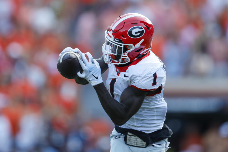 Georgia wide receiver Marcus Rosemy-Jacksaint (1) catches a pass during the first half of an NCAA football game against Auburn on Saturday, Sept. 30, 2023, in Auburn, Ala. (AP Photo/Stew Milne)