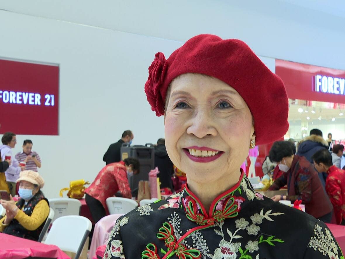 Catherine Fung is the arts and culture event planning director with the Essex County Chinese Canadian Association. She says it is great to be celebrating Lunar New Year in public again after two years off due to the COVID-19 pandemic. (TJ Dhir/CBC - image credit)