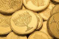 <p>Instead, children often receive gelt (a.k.a. money) from the adults, as <a href="https://www.livescience.com/61073-hanukkah-history-traditions.html" rel="nofollow noopener" target="_blank" data-ylk="slk:Live Science" class="link rapid-noclick-resp">Live Science</a> says. Chocolate coins wrapped in gold foil, used in the traditional Jewish game of dreidel, are called gelt. However, some families may choose to give gifts to family.</p><p><strong>RELATED: </strong><a href="https://www.goodhousekeeping.com/holidays/gift-ideas/g3988/hanukkah-gifts-for-everyone/" rel="nofollow noopener" target="_blank" data-ylk="slk:35 Meaningful Hanukkah Gifts Perfect for the Kids and Adults in Your Life" class="link rapid-noclick-resp">35 Meaningful Hanukkah Gifts Perfect for the Kids and Adults in Your Life</a></p>