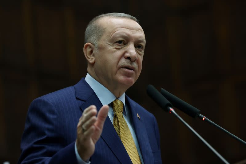 FILE PHOTO: Turkish President Erdogan addresses members of his ruling AK Party during a meeting at the parliament in Ankara