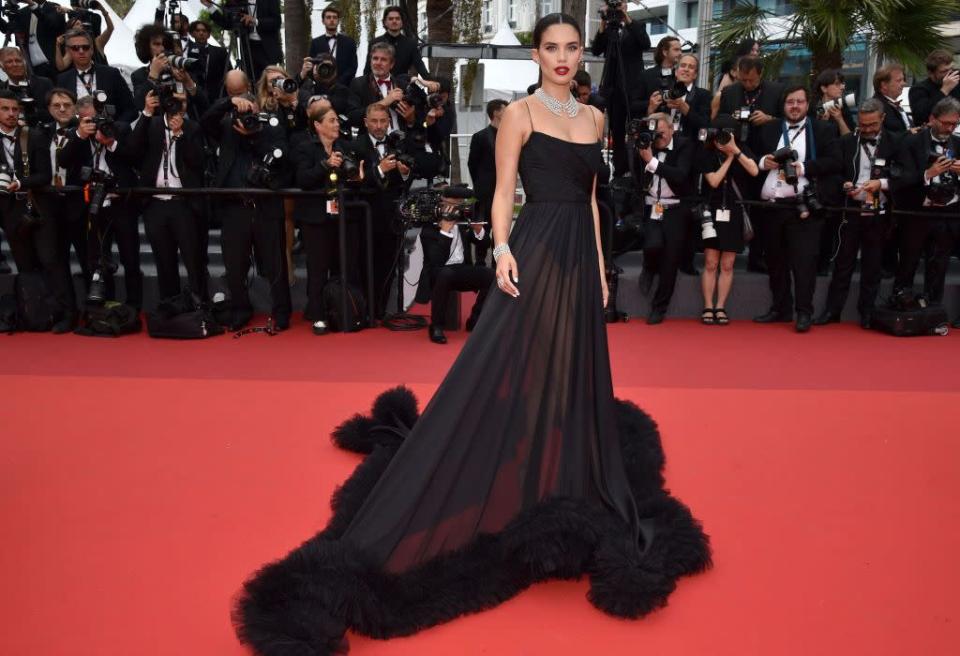 <p>Sampaio stunned in a lingerie-inspired, sheer black look by Pinko and Messika jewels.</p>