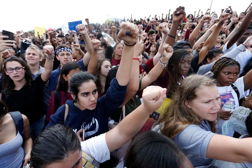 Students rally at Marjory Stoneman Douglas High School after participating in a county wide school walk out in Parkland, Florida on Feb. 21, 2018. (Photo: RHONA WISE via Getty Images)