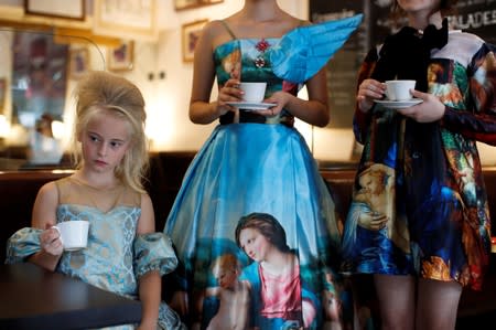 Model Daisy-May Demetre, 9 year-old double amputee who will walk the runway during Paris Fashion Week, is seen during a photo shoot a day before the luxury children's wear label Lulu et Gigi show in Paris