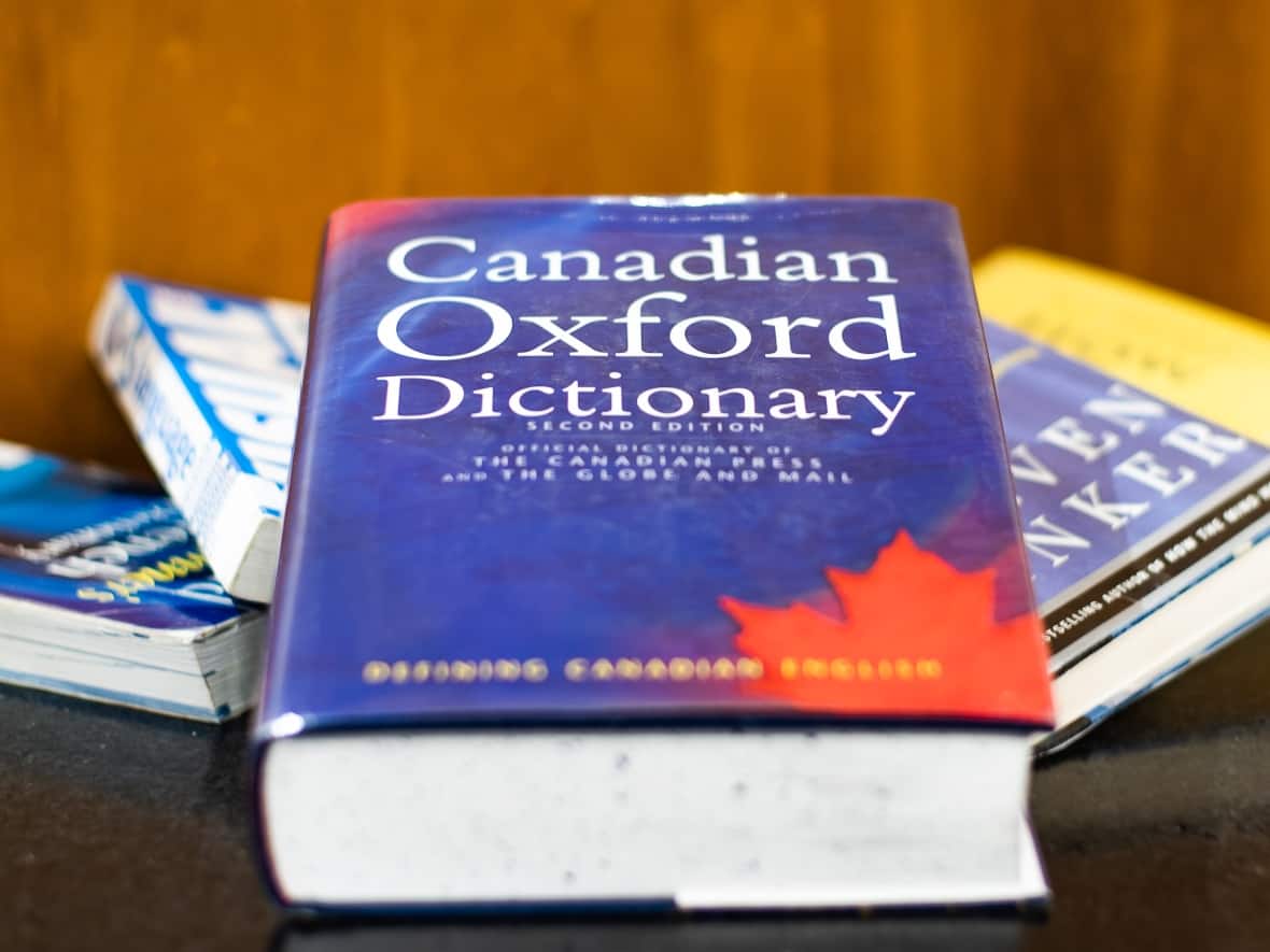 A copy of the Canadian Oxford Dictionary. First published in 1998 under editor-in-chief Katherine Barber, the dictionary was last updated in 2004, making it difficult for writers and editors to remain current on the changing nature of Canadian English.  (Jackson Weaver/CBC - image credit)