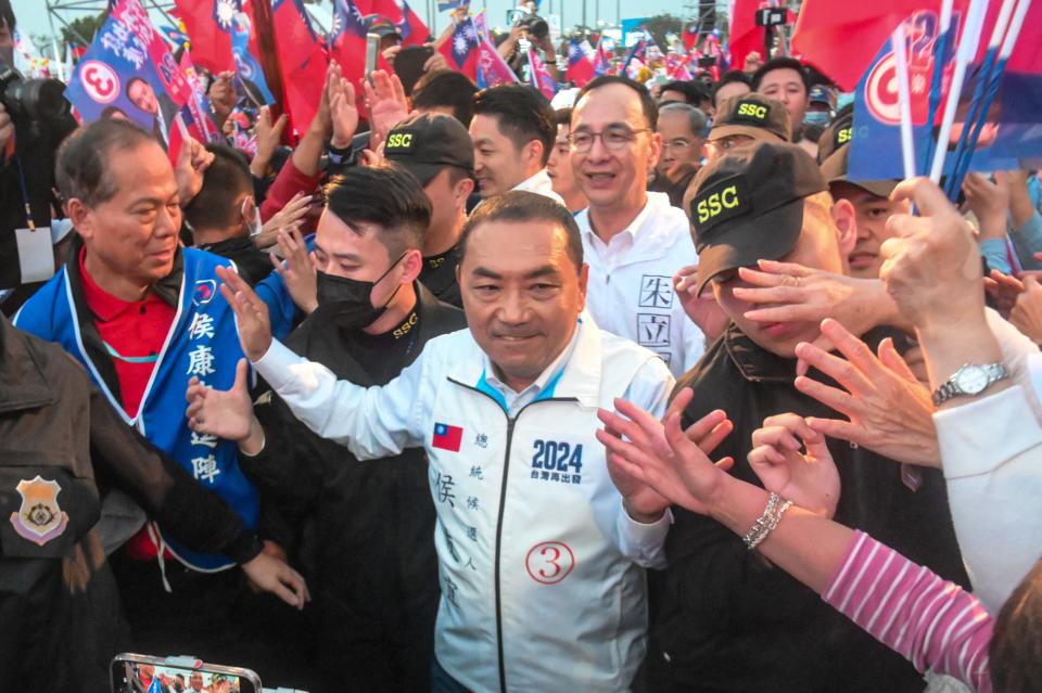 Hou Yu-ih, Taiwan presidential candidate from the main opposition Kuomintang (KMT), is greeted by supporters during a campaign rally in Kaohsiung on January 7, 2024.