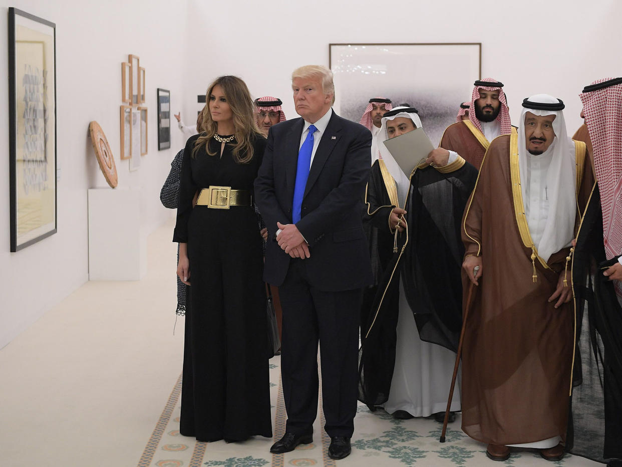 Saudi Arabia's King Salman bin Abdulaziz al-Saud, US President Donald Trump and US First Lady Melania Trump look at a display of Saudi modern art at the Saudi Royal Court in Riyadh: AFP/Getty Images