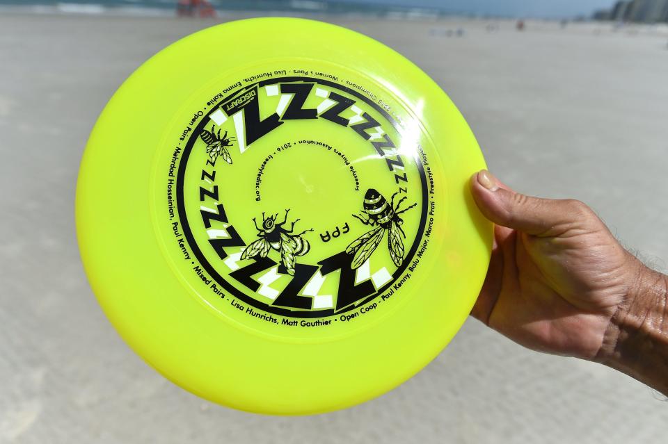 A Frisbee issued by the Freestyle Players Association in 2016 has Paul Kenny's name listed several times for multiple wins in competition.