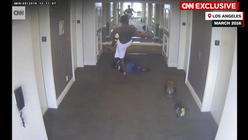 This frame grab taken from hotel security camera video and aired by CNN appears to show Sean "Diddy" Combs attacking singer Cassie in a Los Angeles hotel hallway in March 2016. (Hotel Security Camera Video/CNN via AP)