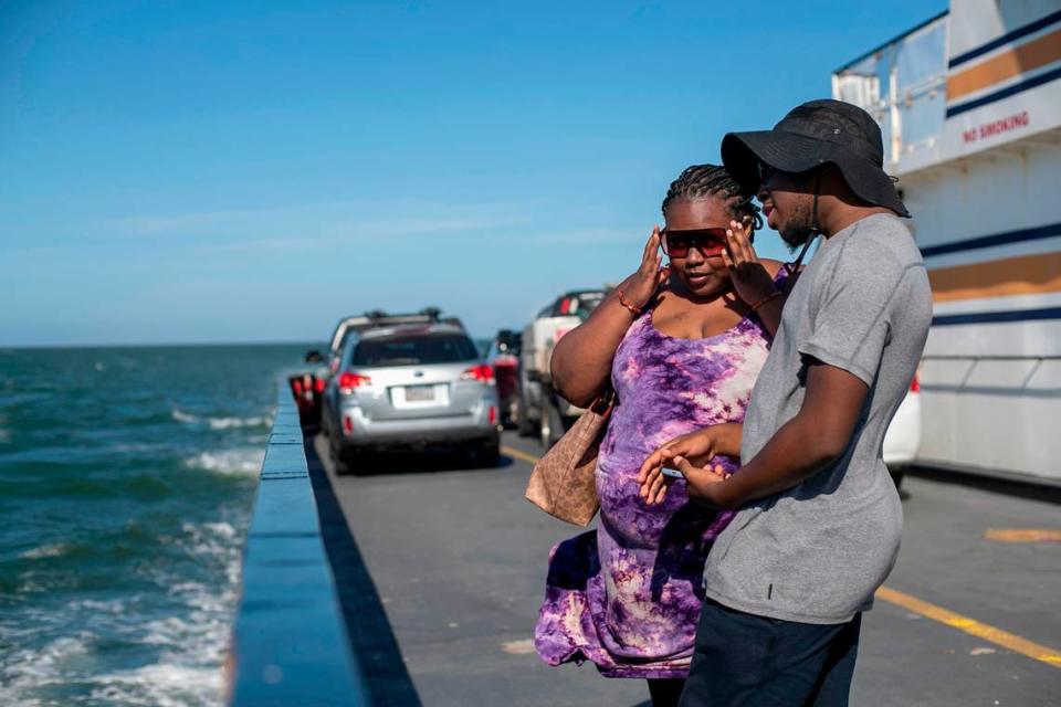 Nazir Jones and Nahjae Chapman of Kannapolis, N.C. ride the Cape Point Ferry from Hatteras to Ocracoke on Thursday, July 1, 2021.