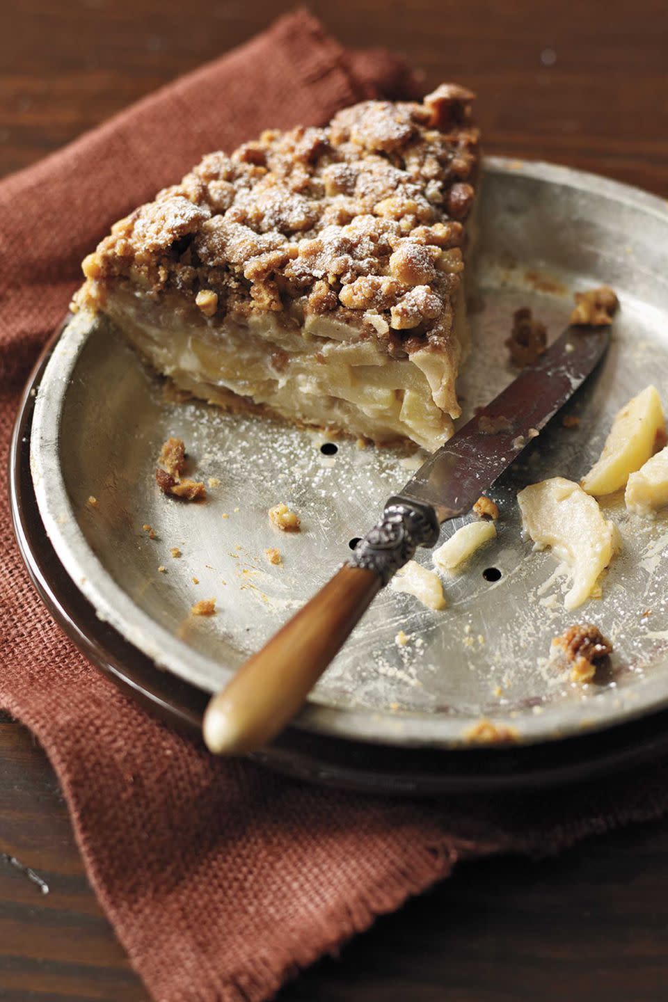 <p>Plain apple pie will seem passé after you sample this version, with its filling of mixed apples, sour cream and cardamom, and a streusel topping made with light brown sugar, cinnamon and walnuts.<br><strong><br></strong><a rel="nofollow noopener" href="https://www.womansday.com/food-recipes/food-drinks/recipes/a11041/walnut-streusel-sour-cream-apple-pie-recipe-122481/" target="_blank" data-ylk="slk:Get the recipe.;elm:context_link;itc:0;sec:content-canvas" class="link "><strong>Get the recipe.</strong></a></p>