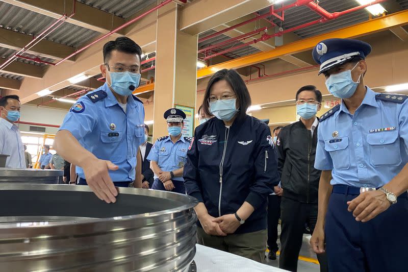 Taiwan's President Tsai Ing-wen visits an Air Force maintenance centre at the Gangshan air base in Kaohsiung, Taiwan