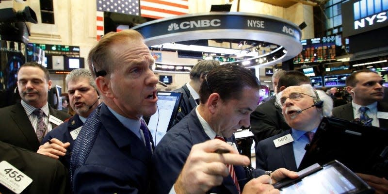 Traders work on the floor of the New York Stock Exchange (NYSE) in New York City, NY, U.S. November 23, 2016. REUTERS/Brendan McDermid 