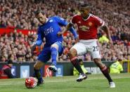 Britain Football Soccer - Manchester United v Leicester City - Barclays Premier League - Old Trafford - 1/5/16 Leicester City's Christian Fuchs in action with Manchester United's Antonio Valencia Reuters / Darren Staples