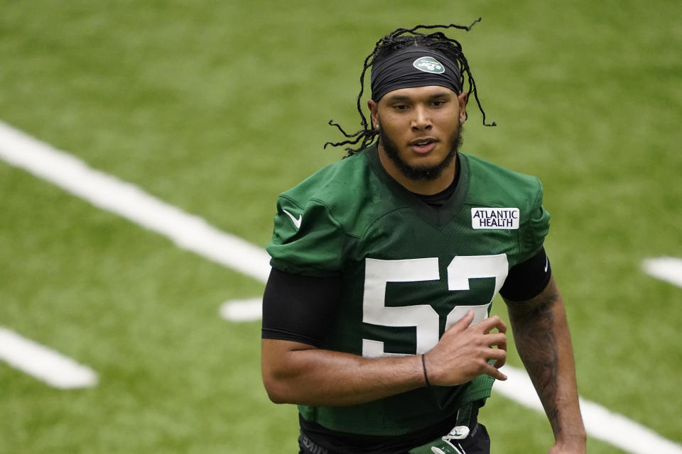 New York Jets' defensive lineman Jermaine Johnson (52) practices during the NFL football team's training camp, Friday, May 6, 2022, in Florham Park, N.J. (AP Photo/John Minchillo)