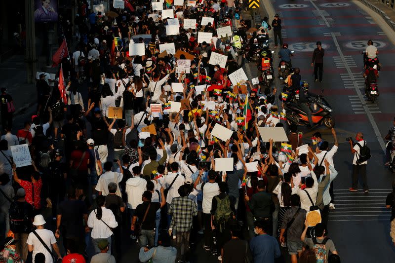 People attend an anti-government protest in Bangkok