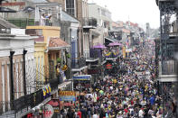 Bourbon Street is a sea of humanity on Mardi Gras day in New Orleans, Tuesday, Feb. 25, 2020. (AP Photo/Rusty Costanza)