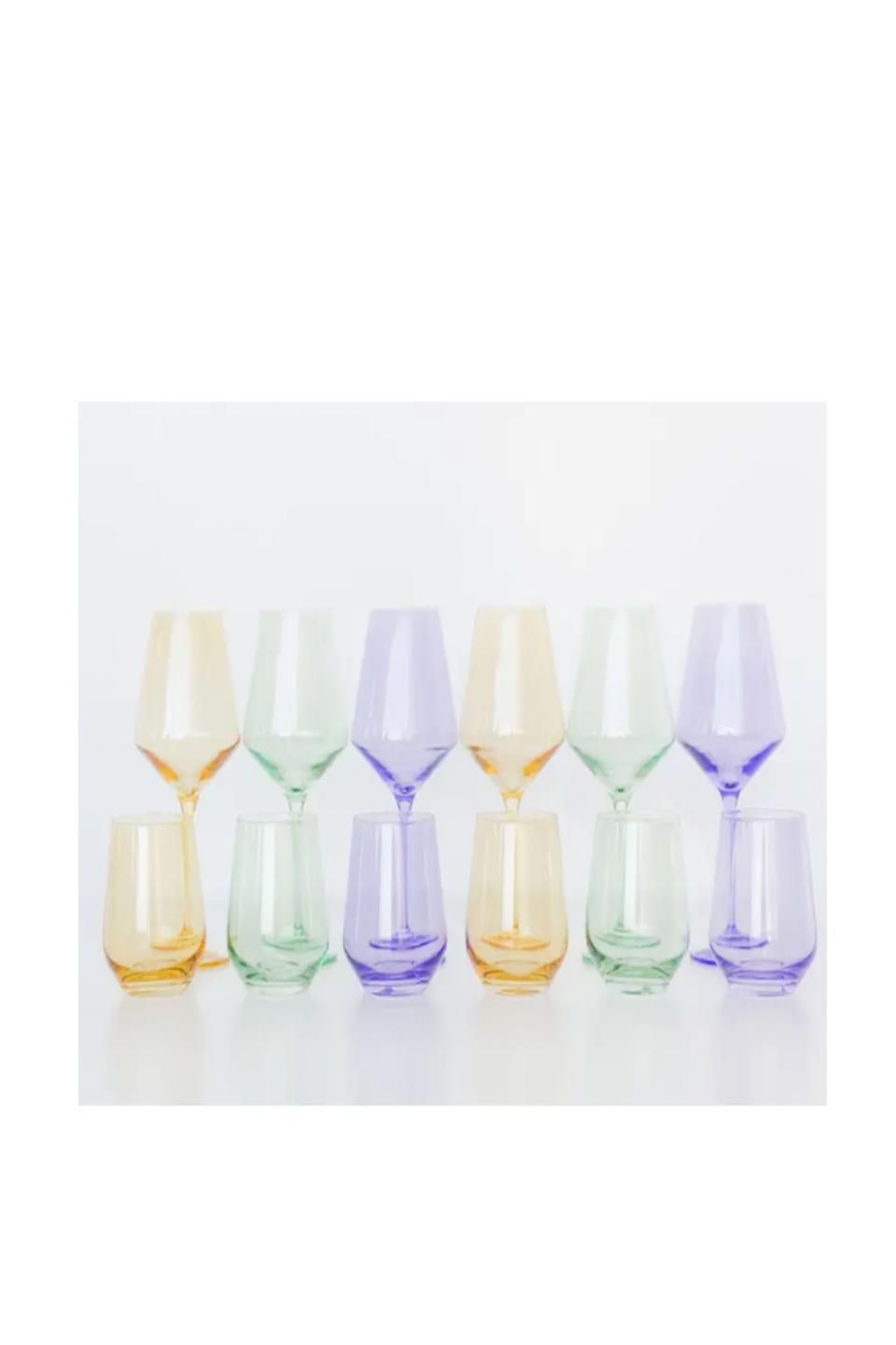 <p><strong>Estelle Colored Glass</strong></p><p>nordstrom.com</p><p><strong>$75.00</strong></p><p><a href="https://go.redirectingat.com?id=74968X1596630&url=https%3A%2F%2Fwww.nordstrom.com%2Fs%2F5964866&sref=https%3A%2F%2Fwww.goodhousekeeping.com%2Fholidays%2Fgift-ideas%2Fg225%2Fhostess-gifts%2F" rel="nofollow noopener" target="_blank" data-ylk="slk:Shop Now" class="link ">Shop Now</a></p><p>Every good hostess deserves a special set of wine glasses. These stemless hand-blown tumblers come in a slew of colors — 15 to be exact — that will instantly add vintage style to their tabletop. </p>