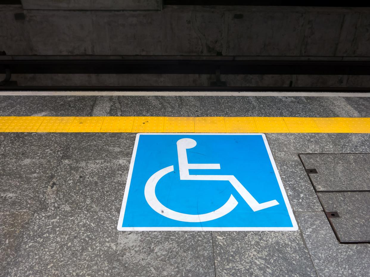 A stock photo of a wheelchair sign at a subway station in São Paulo, Brazil.