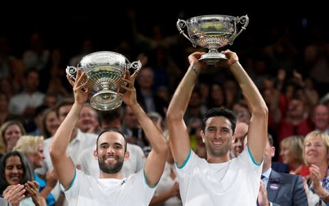 Robert Farah (r) won the Wimbledon men's doubles title with Juan-Sebastian Cabal last year - Credit: Reuters