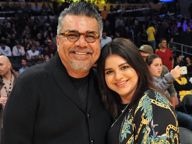 <p>Allen Berezovsky/Getty</p> George Lopez and his daughter Mayan Lopez attend a basketball game between the Los Angeles Lakers and the Oklahoma City Thunder on Jan. 3, 2018 in Los Angeles, California.