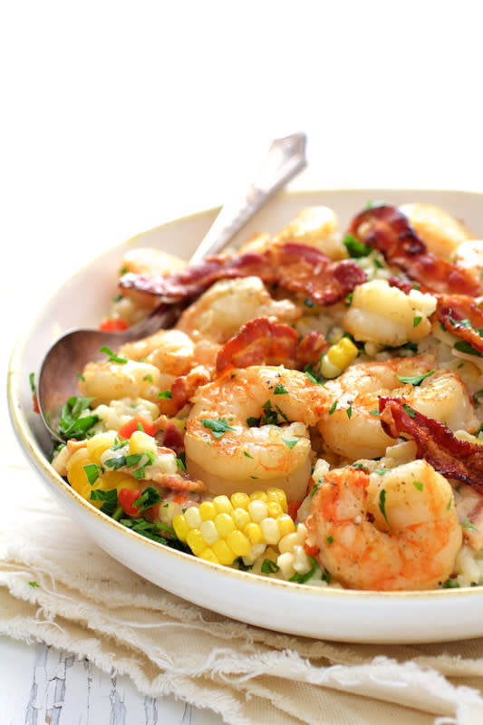 <p>From A Chef's Kitchen</p><p>Shrimp and corn risotto with bacon is an American twist on traditional risotto and the perfect summer comfort food!</p><p><strong>Get the recipe: <a href="https://www.fromachefskitchen.com/shrimp-and-corn-risotto-with-bacon/" rel="nofollow noopener" target="_blank" data-ylk="slk:Shrimp and Corn Risotto with Bacon;elm:context_link;itc:0;sec:content-canvas" class="link rapid-noclick-resp">Shrimp and Corn Risotto with Bacon</a></strong></p>