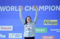 Gold medalist Lilly King of the United States celebrates after the Women 200m Breaststroke final at the 19th FINA World Championships in Budapest, Hungary, Thursday, June 23, 2022. (AP Photo/Petr David Josek)