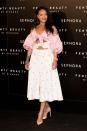<p>In a Marianna Senchina floral dress with Chopard jewelry and Olgana Paris pink heels for her Fenty Beauty launch in Madrid. </p>