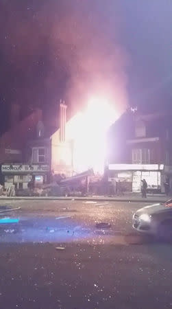 Flames leap into the sky from the site of an explosion in Leicester, Britain, February 25, 2018 in this still image taken from a video obtained from social media. FACEBOOK/DAVID CRITCHLOW/via REUTERS