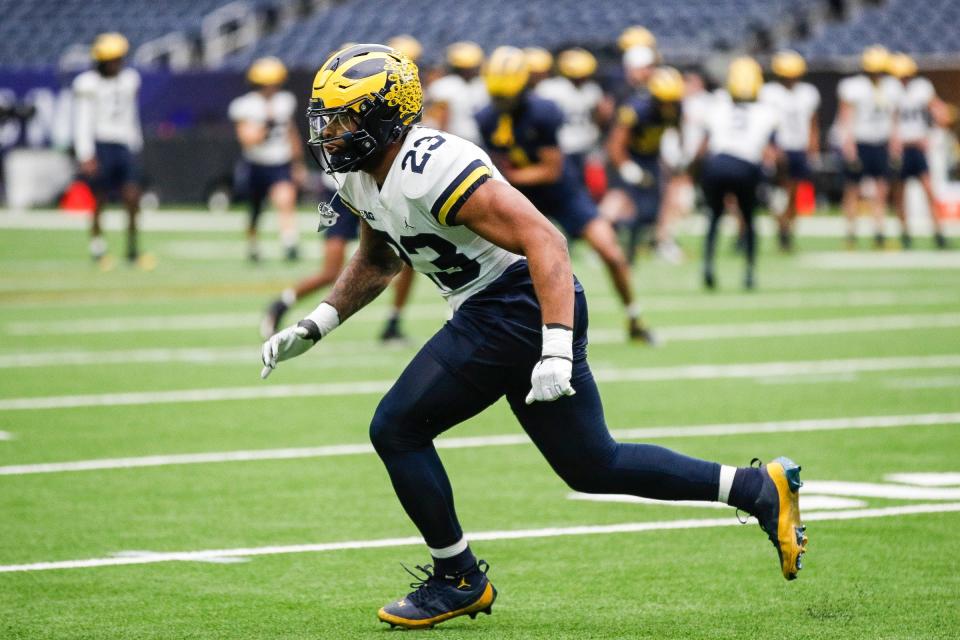 Michigan linebacker Michael Barrett (23) warms up during open practice at NRG Stadium in Houston, Texas on Saturday, Jan. 6, 2024.