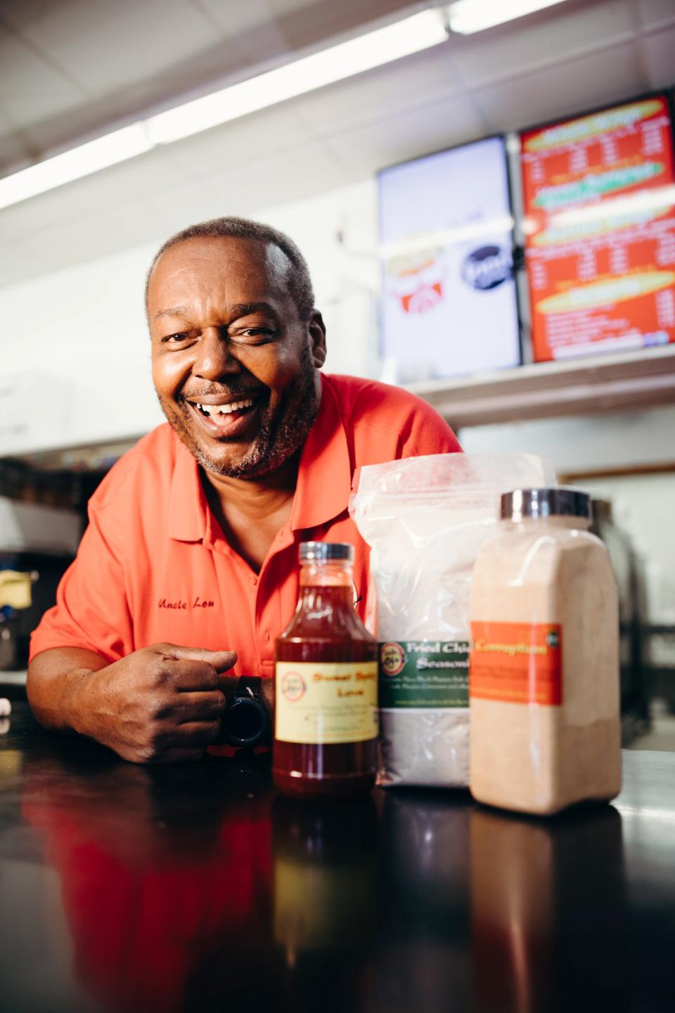 Chef and Owner Lou Martin Posing at Uncle Lou's in Memphis, Tennessee, as seen on Diners, Drive-Ins and Dives: Take Out.