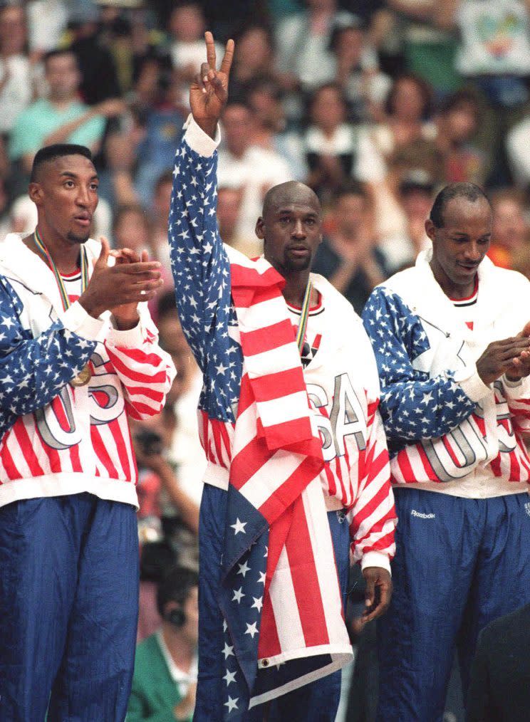 The U.S. flag covers the Reebok logo on Michael Jordan's warmups in 1992. (AP)