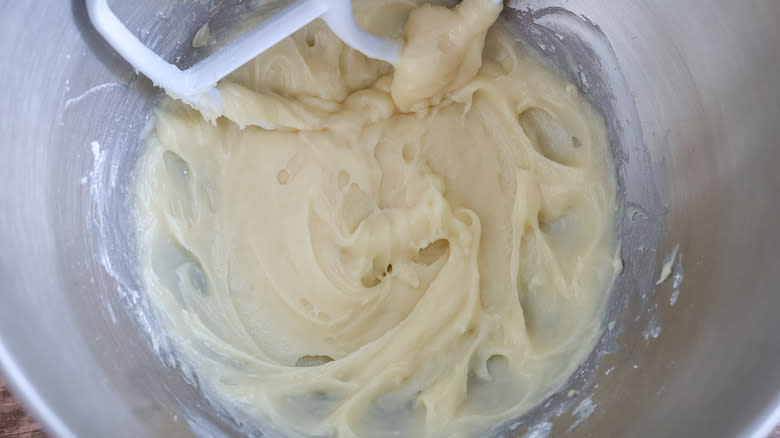 frosting in the bowl of a stand mixer