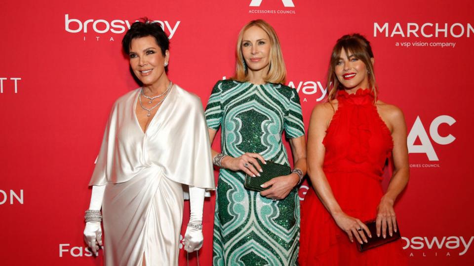 Julianne pictured alongside Kris Jenner and Dee Ocleppo at the ACE Awards