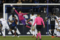 Vancouver Whitecaps goalkeeper Yohei Takaoka (18) fails to block a shot by San Jose Earthquakes forward Jeremy Ebobisse (11) for a goal during the second half of an MLS soccer match in San Jose, Calif., Saturday, March 4, 2023. (AP Photo/Josie Lepe)